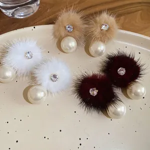 Elegant gold-plated pearl drop earrings with faux fur balls and zircon stones in three colors