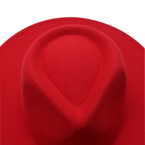 Detailed top view of the classic water drop crown on a red wool felt wide brim fedora