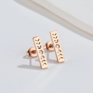 Rose gold stainless steel rectangular earrings featuring moon phase cutout patterns