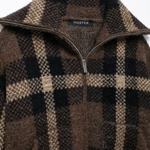 Brown and black plaid knit bomber jacket with retro half-zip stand collar design