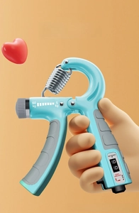 Adjustable hand gripper detail showing the tension spring and 5kg to 60kg scale