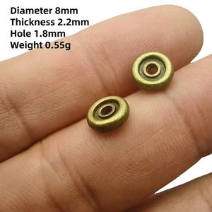 Detail view of 8mm antique bronze wheel spacers for DIY jewelry making size 6