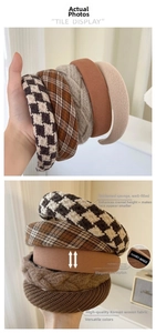 Macro view of thick sponge headbands in houndstooth and knit textures for height