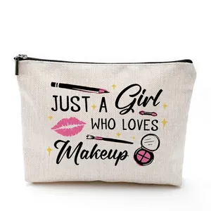 Linen makeup bag with 'Just a Girl Who Loves Makeup' print and silver zipper closure