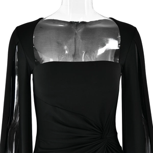 Detail of square neck and twist knot pleated design on this black long sleeve slim dress
