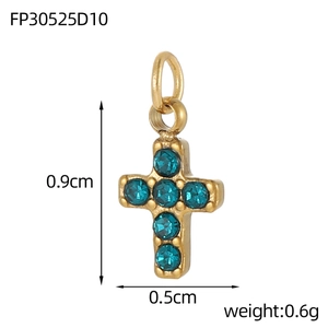 Golden baroque cross pendant with green zircons, dimensions 0.9cm height by 0.5cm width