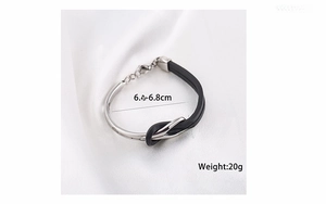 Detail shot of men's titanium steel knot bracelet with black leather measurements