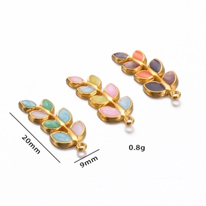 Detailed view of colorful enamel leaf charms with dimensions 20mm x 9mm and 0.8g weight
