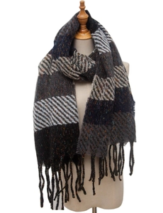 Detail view of woven striped scarf with fringe tassels in grey and navy on a mannequin