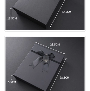 Detailed view of black kraft gift boxes with elegant ribbon and specific size dimensions