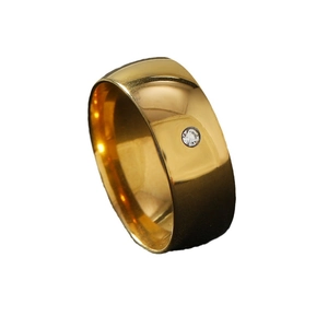 Polished 8mm gold titanium steel ring featuring a single inset round clear gemstone