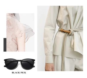 Magazine-style layout featuring black oval sunglasses with minimalist fashion details
