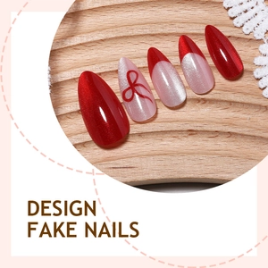 Red cat-eye bow almond fake nails set with hand-painted ribbon and french design