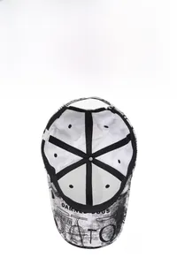 Detail view of graffiti baseball cap interior with stitching and Damned Dogs printed brim