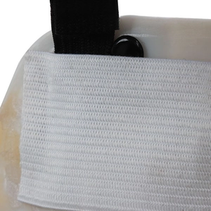 Macro view of white plastic shell with elastic fabric and black buckle for skull mask