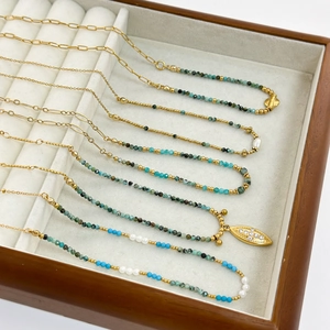 French vintage African stone necklace with 18K gold plated steel and bohemian charms