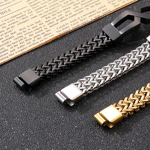 Detailed macro view of men's woven titanium steel bracelets with magnetic clasps in three colors