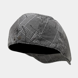 Classic British style houndstooth flat cap with metal side button and black lining