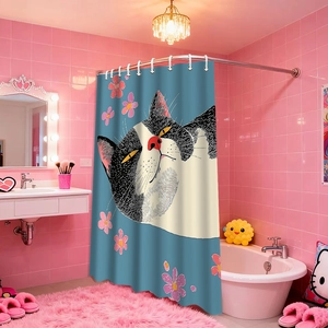 Detail of waterproof blue shower curtain featuring a cartoon cat and floral pattern