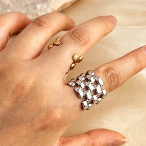 18k gold plated stainless steel open ring and silver woven band on model fingers