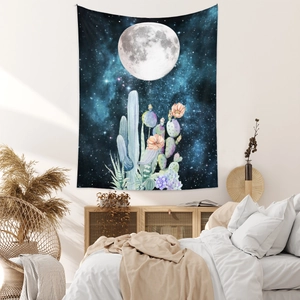 Detailed starry sky tapestry featuring moon, cactus and flowers in a bedroom setting