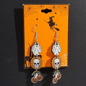 Detail of Halloween wooden earrings featuring ghost, pumpkin, and skeleton flower charms