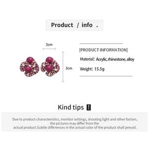 Detail view of purple floral acrylic stud earrings with rhinestones and size dimensions