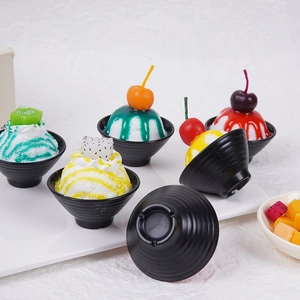 Artificial fruit smoothie bowl models with realistic kiwi and cherry toppings in black bowls