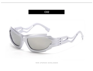 Detail of silver Y2K sunglasses frame with wave structure and hollow design