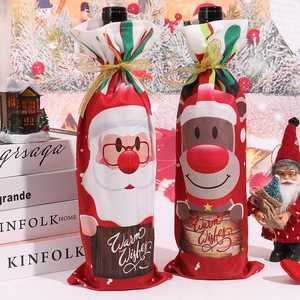Christmas wine bottle covers with Santa and Reindeer designs for holiday table decor