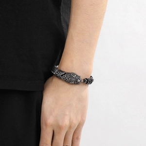 Detailed close-up of a vintage 304 stainless steel dragon head clasp on a keel chain bracelet