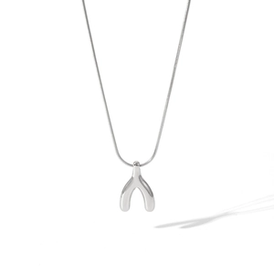 Detailed view of silver starfish Y-pendant necklace on a sleek snake chain and white background