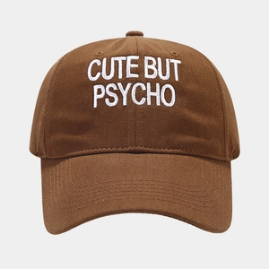 Classic caramel brown cotton baseball cap with white CUTE BUT PSYCHO embroidery