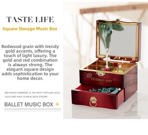 Classic mahogany music box detail showing the spinning ballerina and built-in mirror