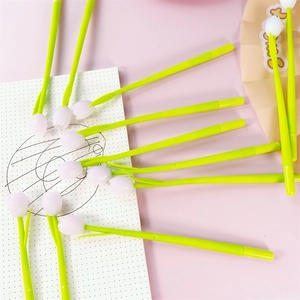 Tulip shaped color changing gel pens set on pink background with white notebook
