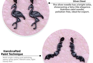 Detailed view of Halloween skull flamingo and bat earrings with matte paint finish