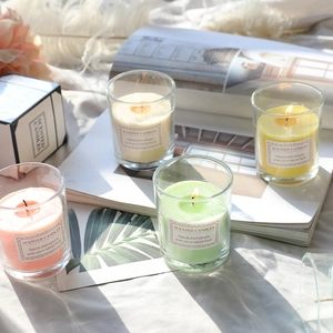 Nordic style scented candles in colorful glass jars with elegant gift box packaging