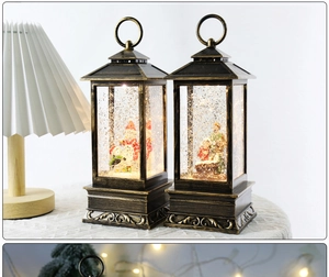 Close-up of vintage bronze Christmas lanterns with snow globe effect and holiday scenes