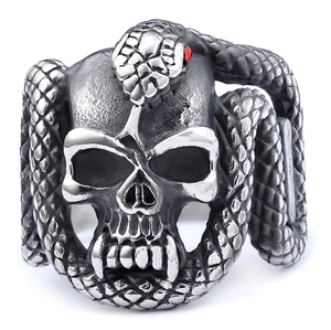Vintage punk skull cobra ring in stainless steel with red gemstone eyes on white background