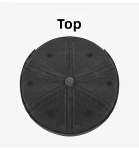 Top view of a black washed cotton docker hat showing six-panel structure and metal eyelets