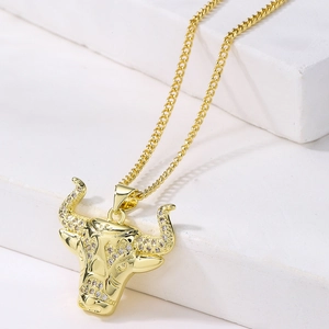 18K gold plated bull head pendant necklace with diamonds on a stylish cuban chain