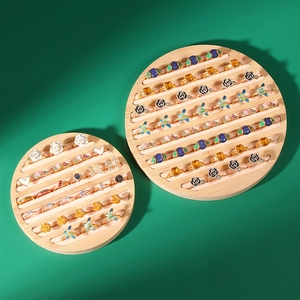 Bamboo wood round ring display tray organizer for jewelry collection showcasing