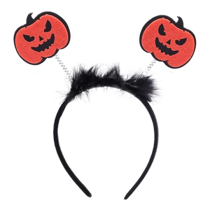Detail of Halloween pumpkin headband with orange felt, black feathers and spring elements