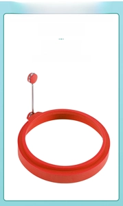 Food-grade red silicone fried egg ring with stainless steel handle for easy cooking