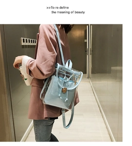 Detail of transparent PVC backpack with sky blue inner bag and stylish drawstring closure