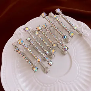 Luxury geometric crystal rhinestone bracelet set with 8 silver pieces on a velvet tray