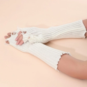 White ribbed knit arm sleeves with distressed hole details and ruffled edges