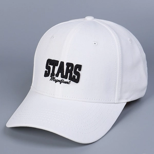 Detailed close-up of STARS Magnificent black embroidery on a white cotton baseball cap