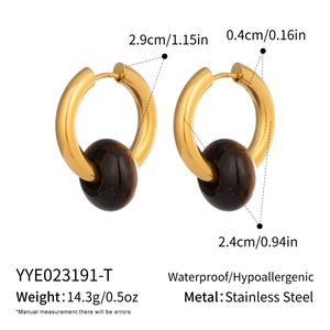 Detail view of 18K gold plated stainless steel hoops with natural tiger eye stone beads