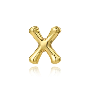 Close-up of golden letter X pendant with shiny metallic balloon texture and reflection